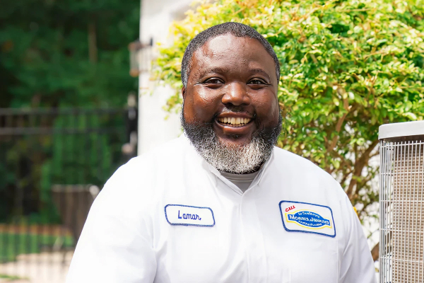 Smiling technician
